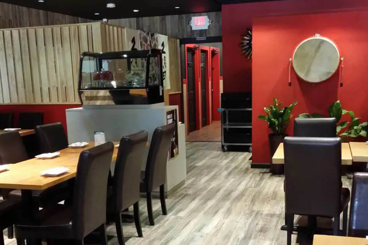 Modern dining room with sushi display case at Yahao Asian Cuisine，an Asian Fusion Restaurant in Great Neck